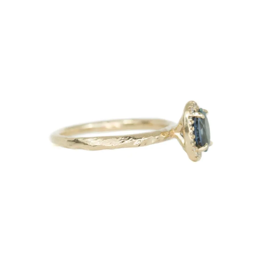 1.04ct Blue Montana Sapphire in 14k Yellow Gold Evergreen Diamond Halo