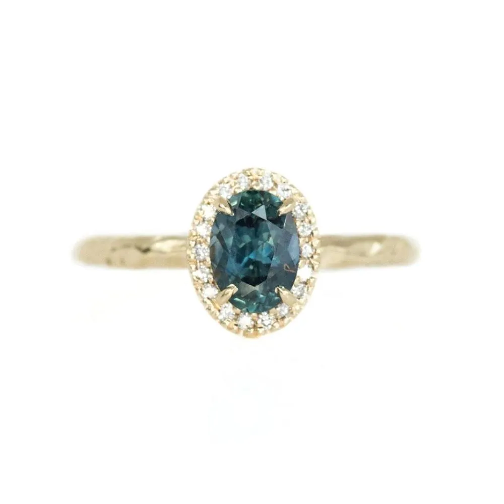 1.04ct Blue Montana Sapphire in 14k Yellow Gold Evergreen Diamond Halo