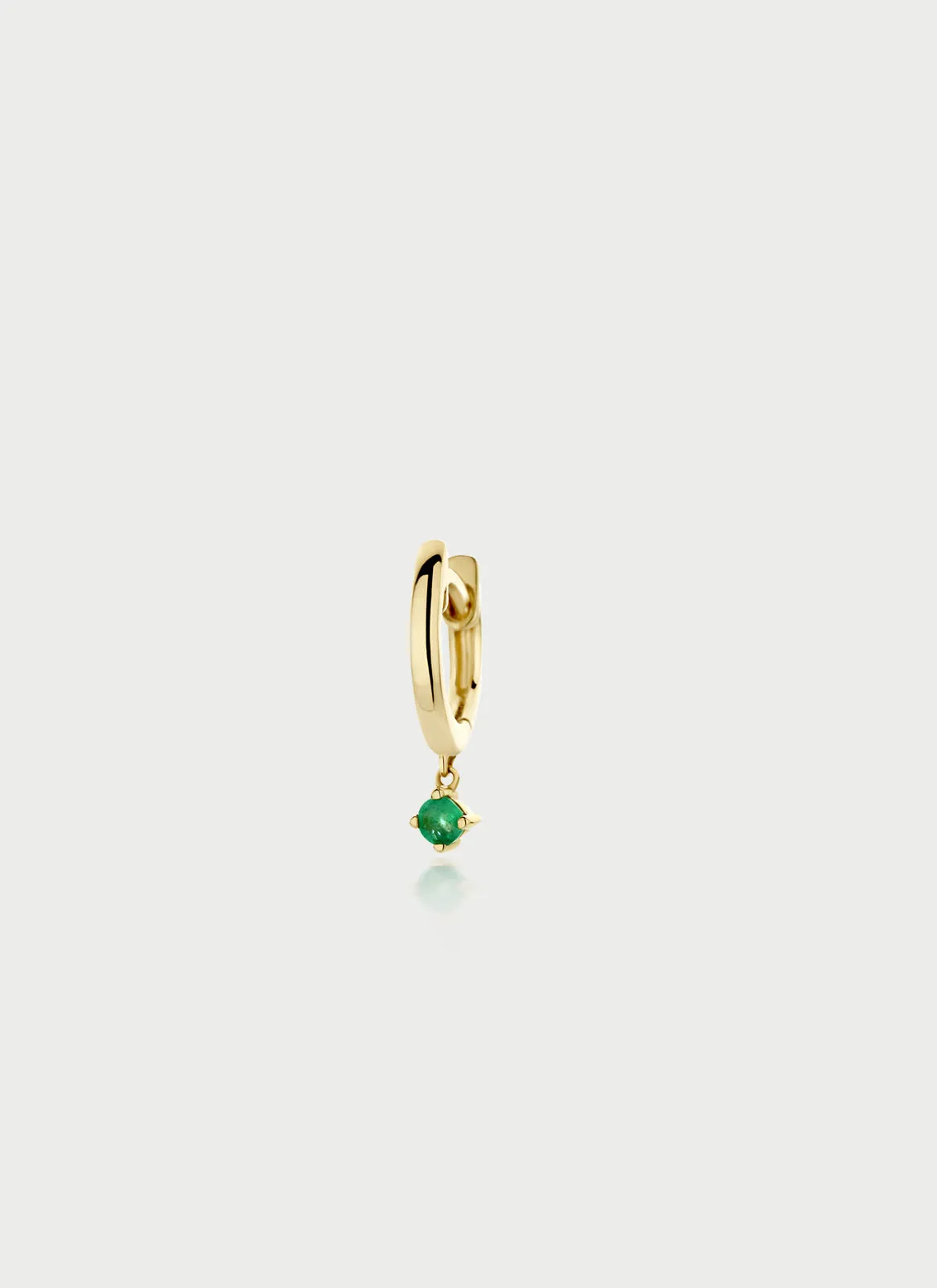 Finn emerald single huggie 14k gold