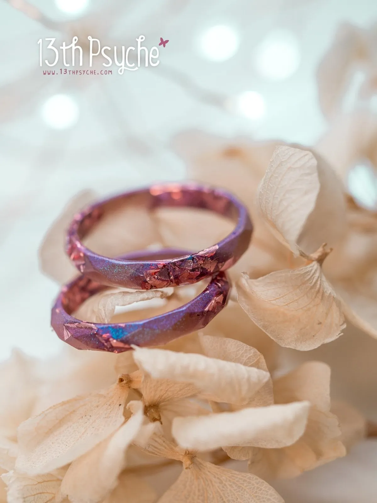 Iridescent pink faceted resin ring with pink metal flakes